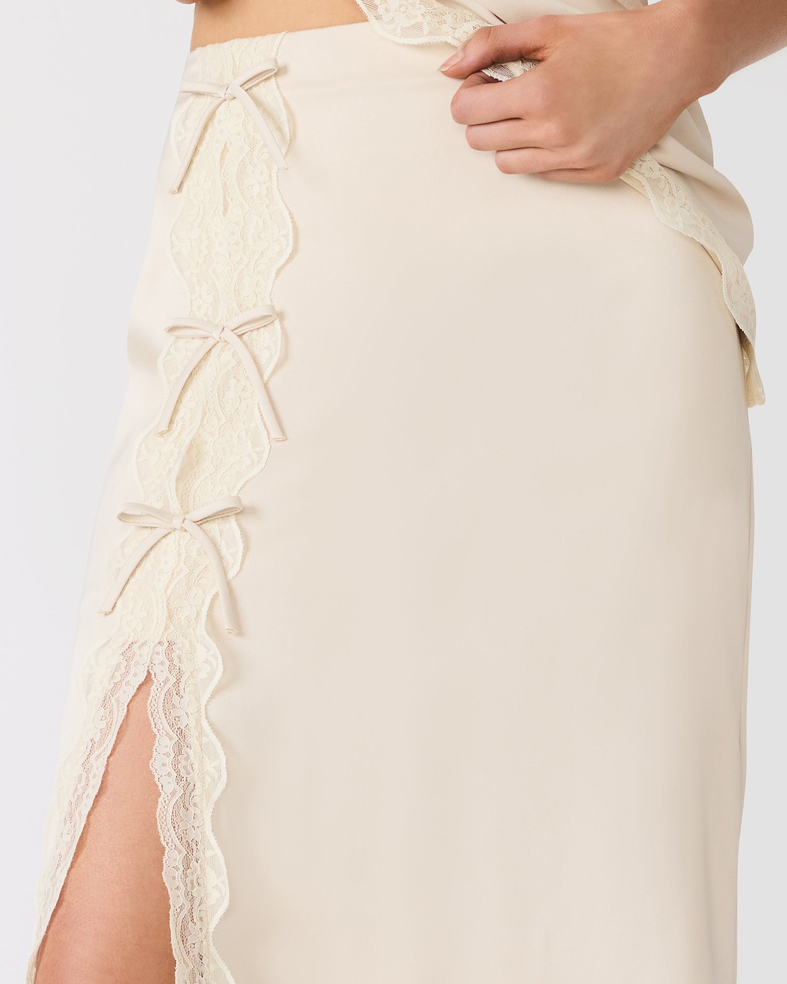 LISSANDRA Ivory Lace Slit Bow Detail Midi Skirt | Women's Designer